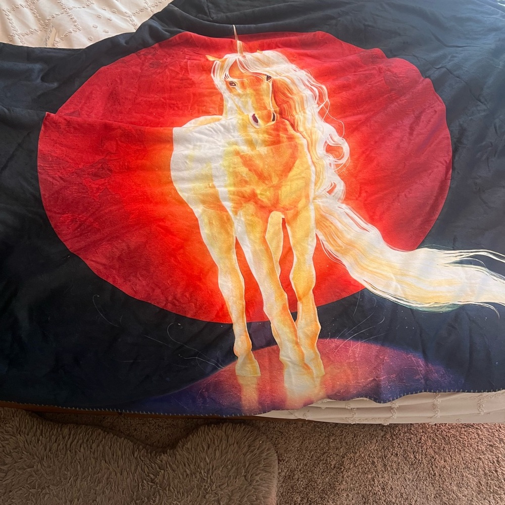 Hooded Electro Threads Unicorn Blanket with Red and Black Design